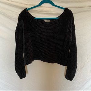 Wide neck sweater.